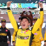 MARTINSVILLE, VIRGINIA - OCTOBER 30: Christopher Bell, driver of the #20 DeWalt Toyota, celebrates in victory lane after winning the NASCAR Cup Series Xfinity 500 at Martinsville Speedway on October 30, 2022 in Martinsville, Virginia. (Photo by Stacy Revere/Getty Images)