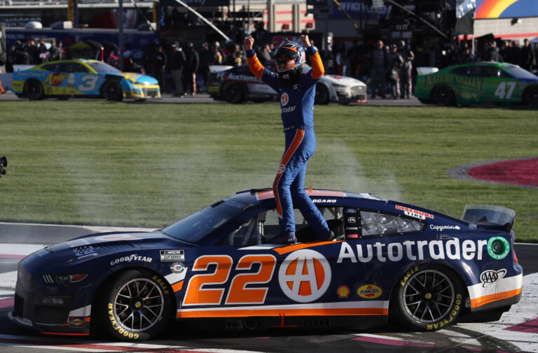 Logano takes Ambetter Health 400 with last-lap pass